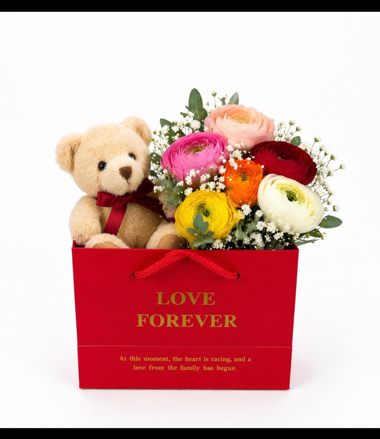 Teddy bear with colorful ranunculus flowers in a red gift box by Raindrops Flower Vancouver